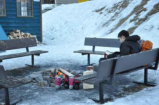 Reading by the fire from toboggan break